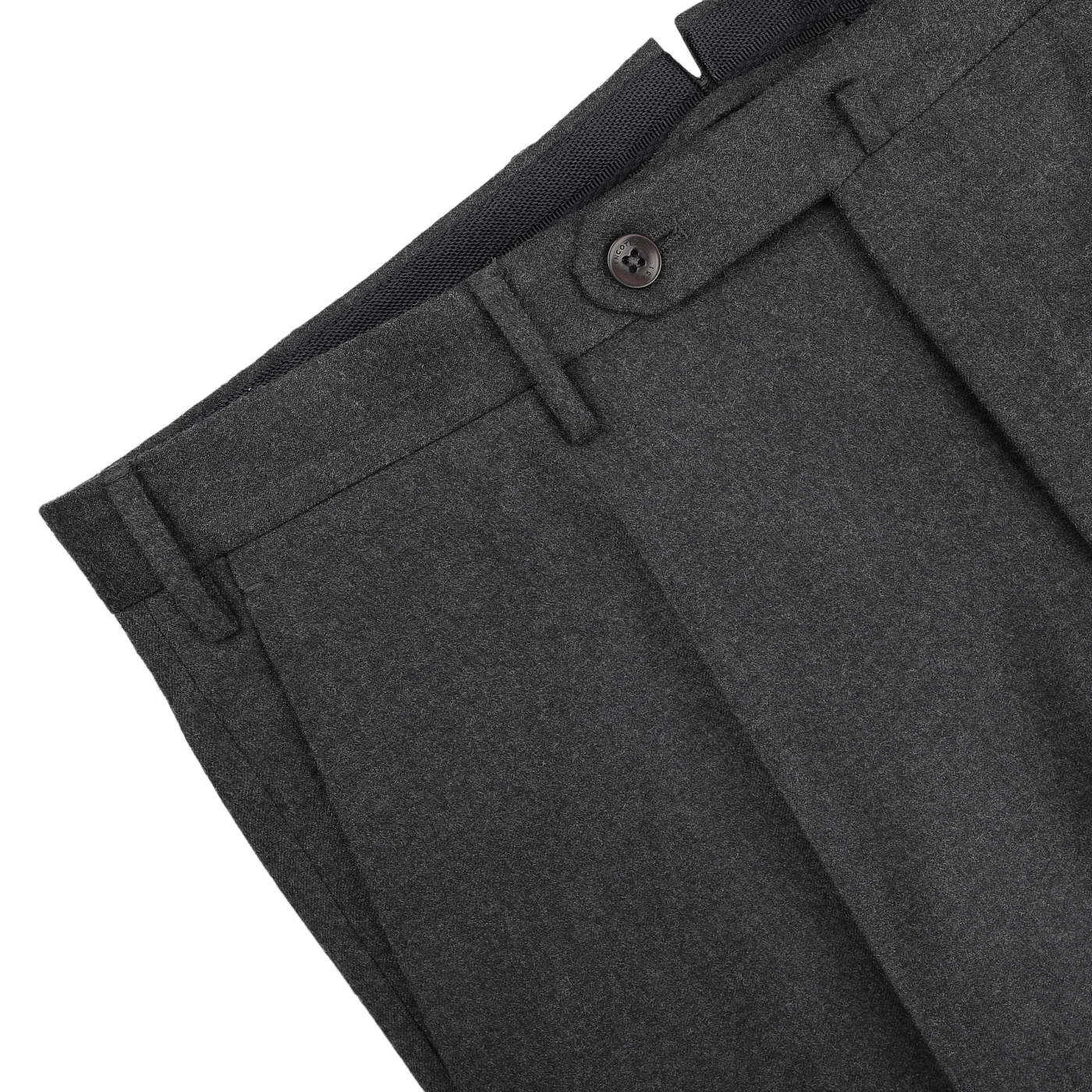 Close-up of Incotex's Charcoal Grey Wool Flannel Slim Trousers, showcasing button details and belt loops against a light backdrop.