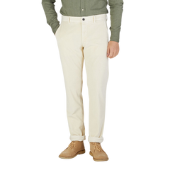 A man in a green shirt and Incotex Cream Beige Cotton Corduroy Slacks Chinos.