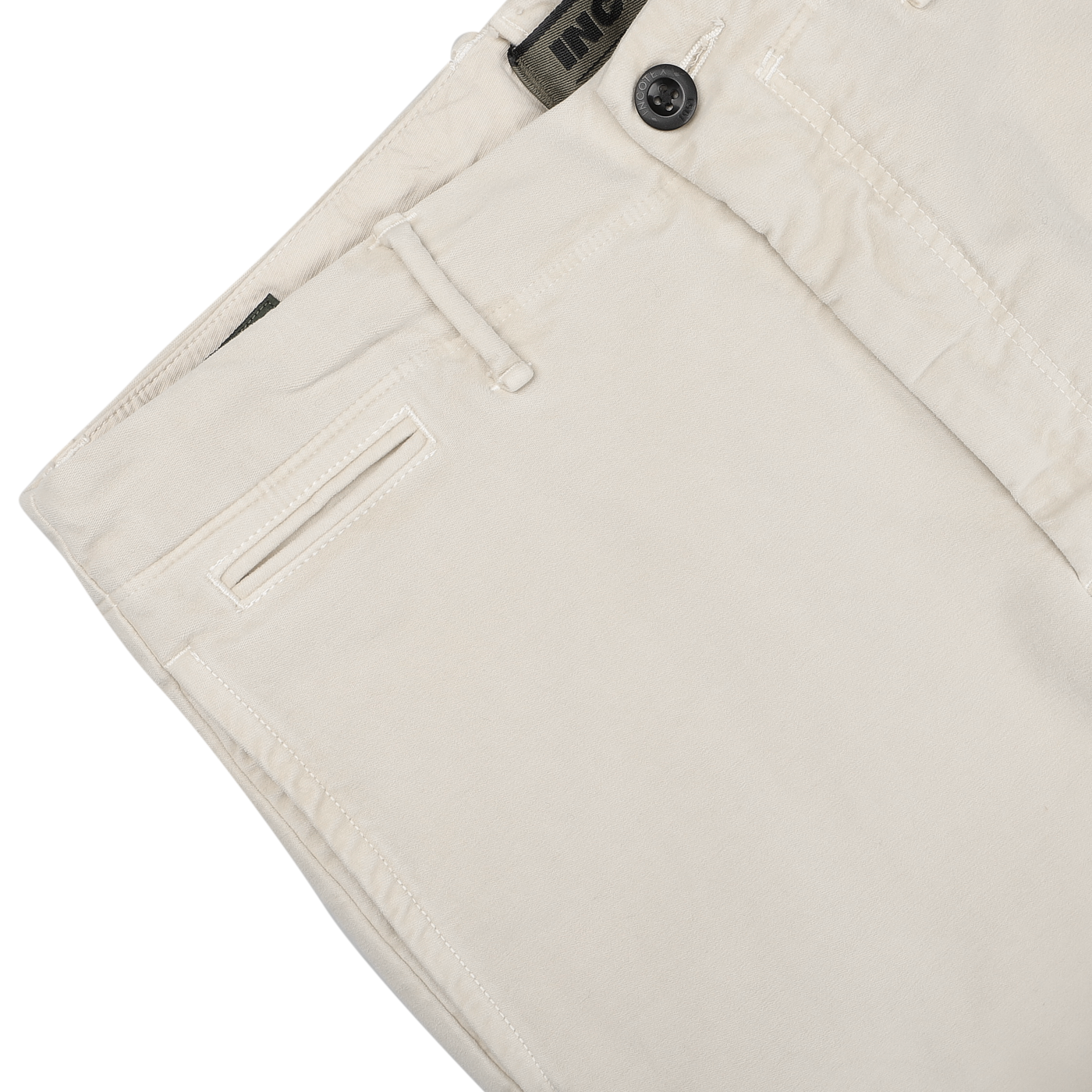 Close-up of Cream Beige Cotton Moleskin Slacks Chinos by Incotex, highlighting the waistband, button, and belt loop details against a neutral background.