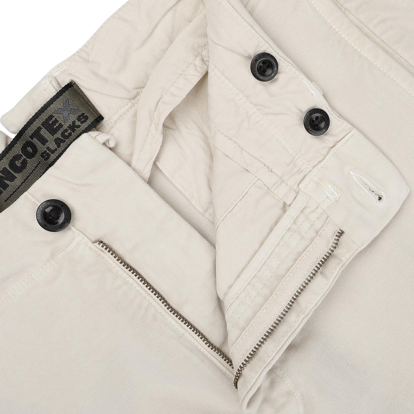 Close-up of Cream Beige Cotton Moleskin Slacks Chinos by Incotex, featuring an open zipper and two black buttons at the waistband.