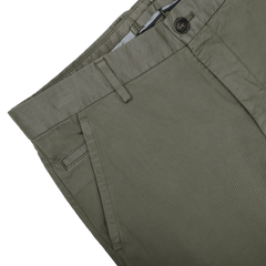 Introducing the Dark Green Cotton Stretch Model 8 Chinos by Incotex: crafted from cotton twill, these chinos offer a regular fit and include a button and zipper fly, with detailed pockets and belt loops set against a neutral background.