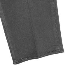 A close-up of the dark grey cotton stretch fabric with visible stitching lines, showcasing part of a slim fit Model 30 pant leg by Incotex.