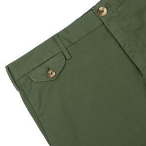 Close-up of Grass Green Cotton Royal Batavia shorts by Incotex with a buttoned pocket detail.