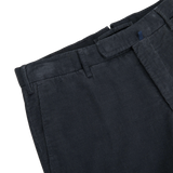 A pair of Grey Micro Cotton Corduroy High Comfort Chinos with blue buttons by Incotex.