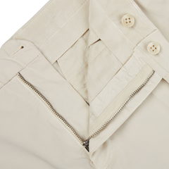 A pair of Incotex Light Beige Cotton Stretch Regular Chinos, featuring zippers on the side for a regular fit.