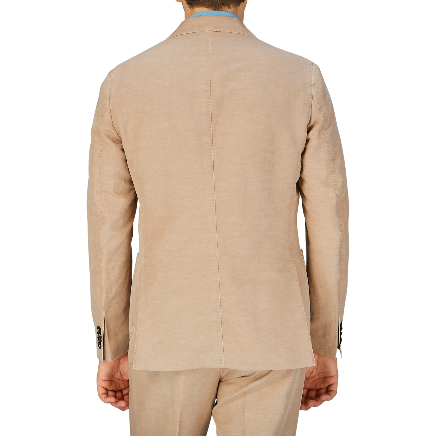 A man viewed from behind wearing a Slowear Light Beige Washed Chinolino Suit jacket.