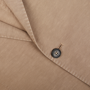 Close-up of a Slowear Light Beige Washed Chinolino Suit jacket with a button.