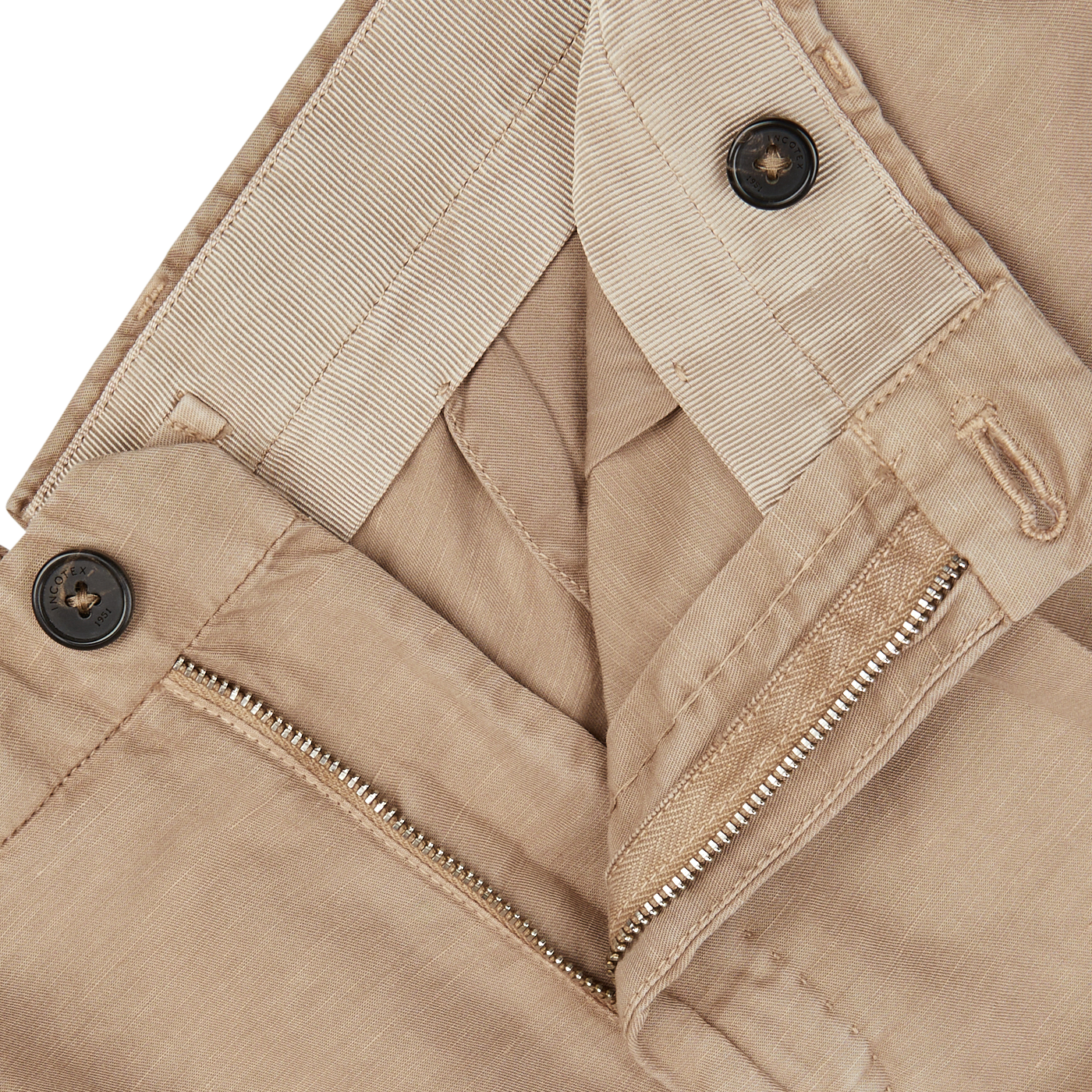 Close-up of a Slowear light beige washed chinolino suit jacket with a zipper and buttons.