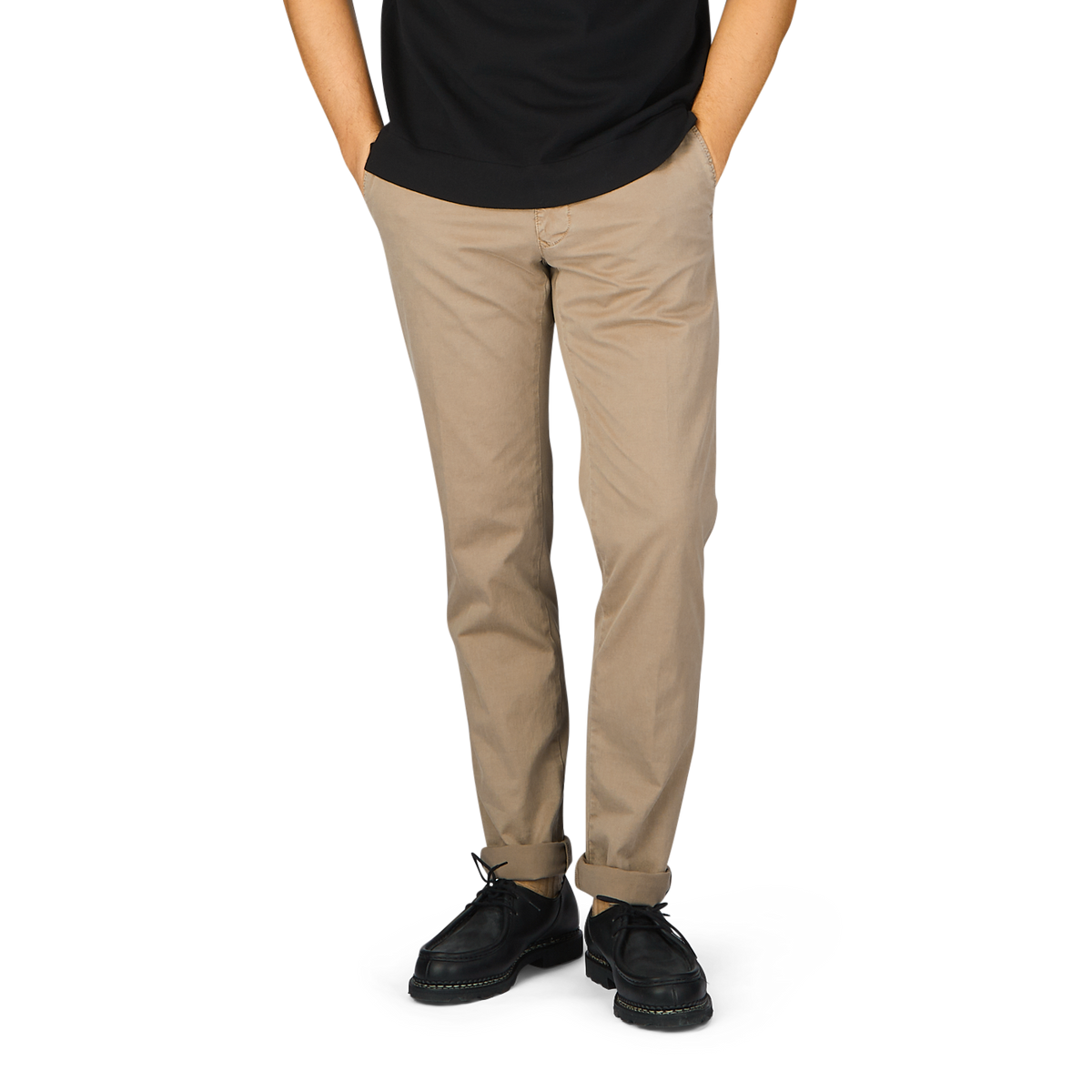 A man wearing a black cotton t-shirt and Incotex khaki chinos.