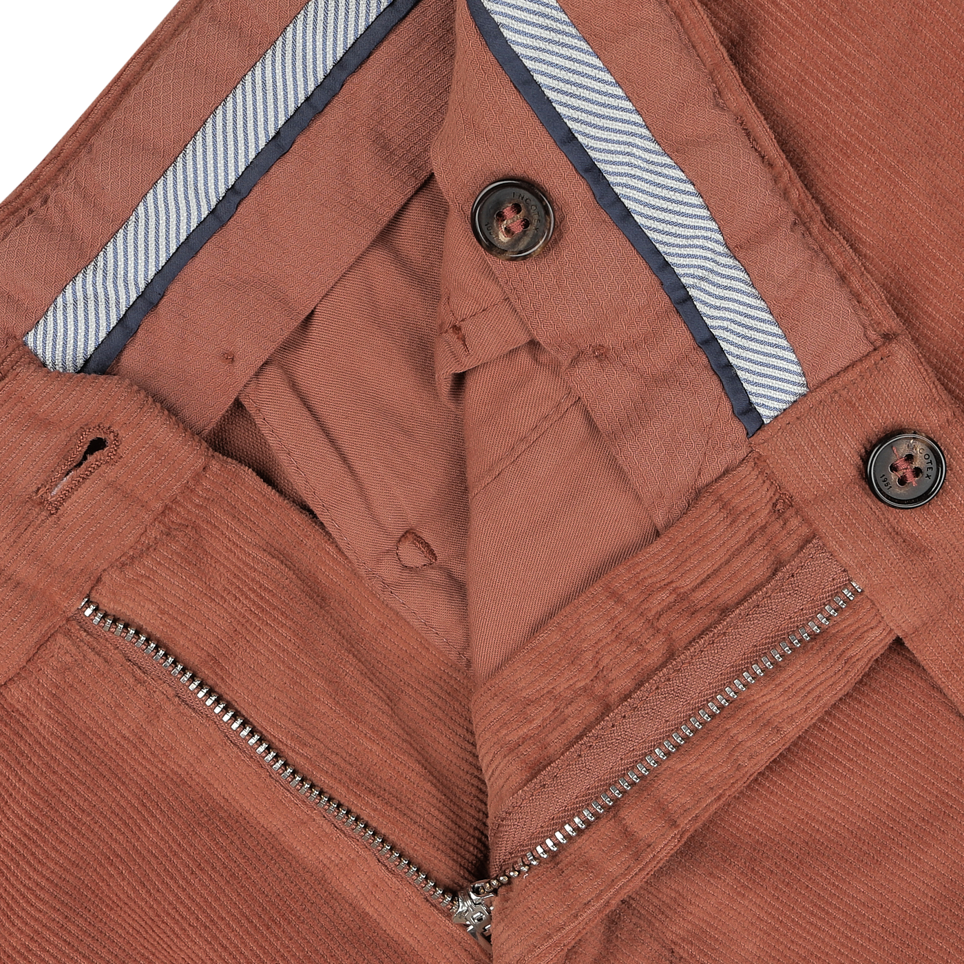 Close-up of the Muted Orange Cotton Corduroy High Comfort Chinos by Incotex highlighting the waistband, button closures, and an open metal zipper.