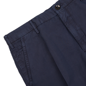 Navy Blue Incotex Chino trousers with button and belt loops detail on a white background.
