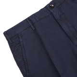 Navy Blue Incotex Chino trousers with button and belt loops detail on a white background.