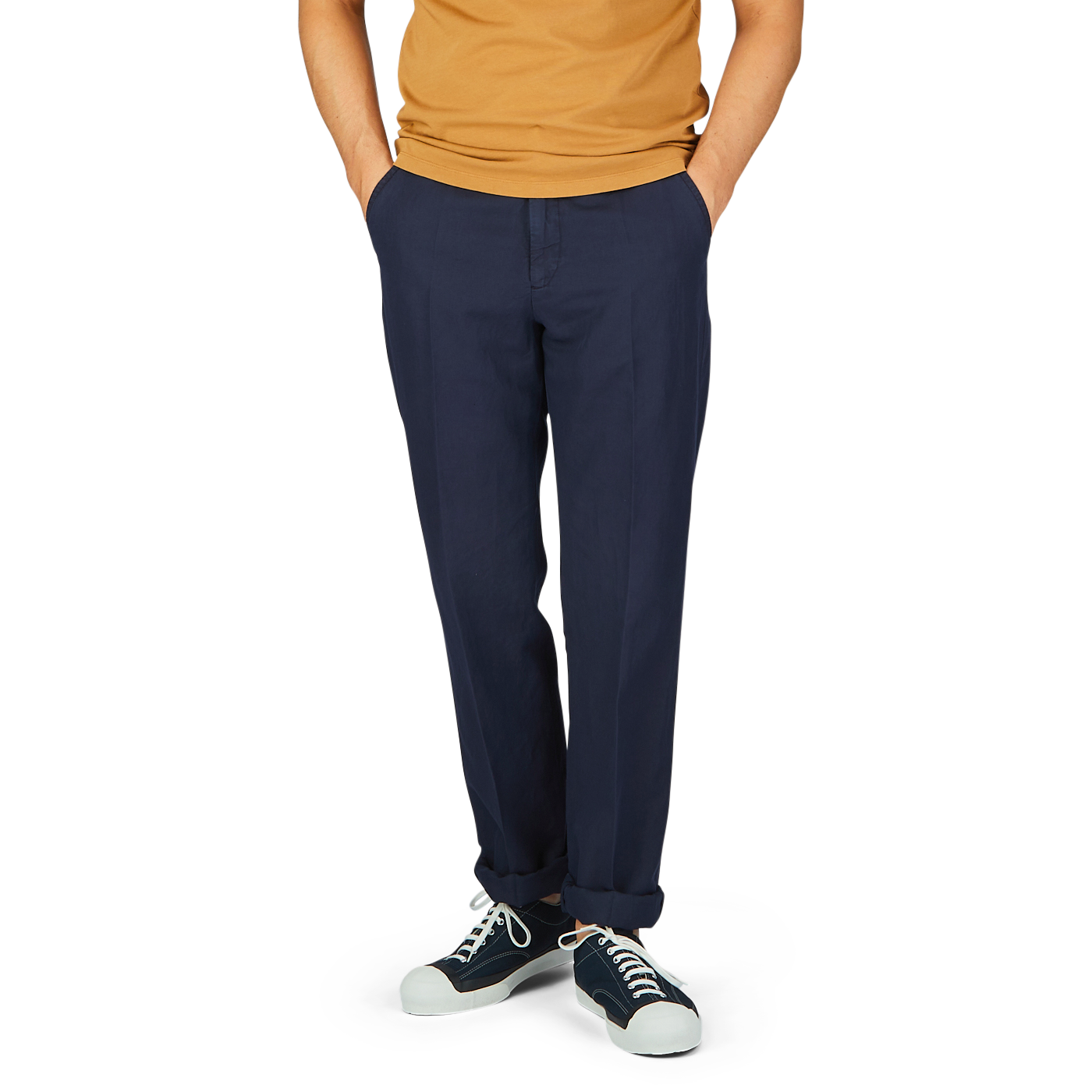 Man wearing a mustard Cotton-Linen Mix shirt and Navy Blue Chinolino Straight Fit Trousers from Incotex with white lace-up sneakers.