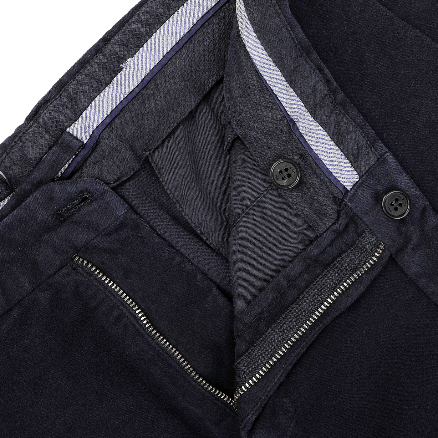 Close-up of Incotex's Navy Blue Cotton Moleskin Model 30 Chinos, showcasing a slim fit with an open zipper and buttons that reveal the soft cotton moleskin inner lining.