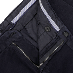 Close-up of Incotex's Navy Blue Cotton Moleskin Model 30 Chinos, showcasing a slim fit with an open zipper and buttons that reveal the soft cotton moleskin inner lining.