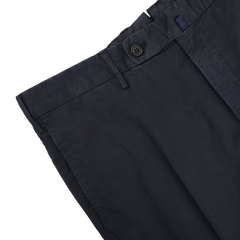 Navy Blue Cotton Royal Batavia Regular Chinos by Incotex, featuring a button closure and belt loops, showcased partially folded on a light background. Crafted from soft cotton twill for comfort and style.