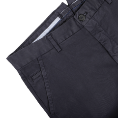 The Incotex Navy Blue Cotton Stretch Model 8 Chinos are presented on a white background. These casual trousers, tailored from cotton twill, are designed with belt loops and slanted side pockets and feature a single button and zip closure, making them ideal for everyday wear.