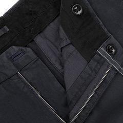 Close-up of a pair of Incotex's Navy Blue Cotton Stretch Regular Model 39 Chinos with a visible zipper and two black buttons on the waistband.