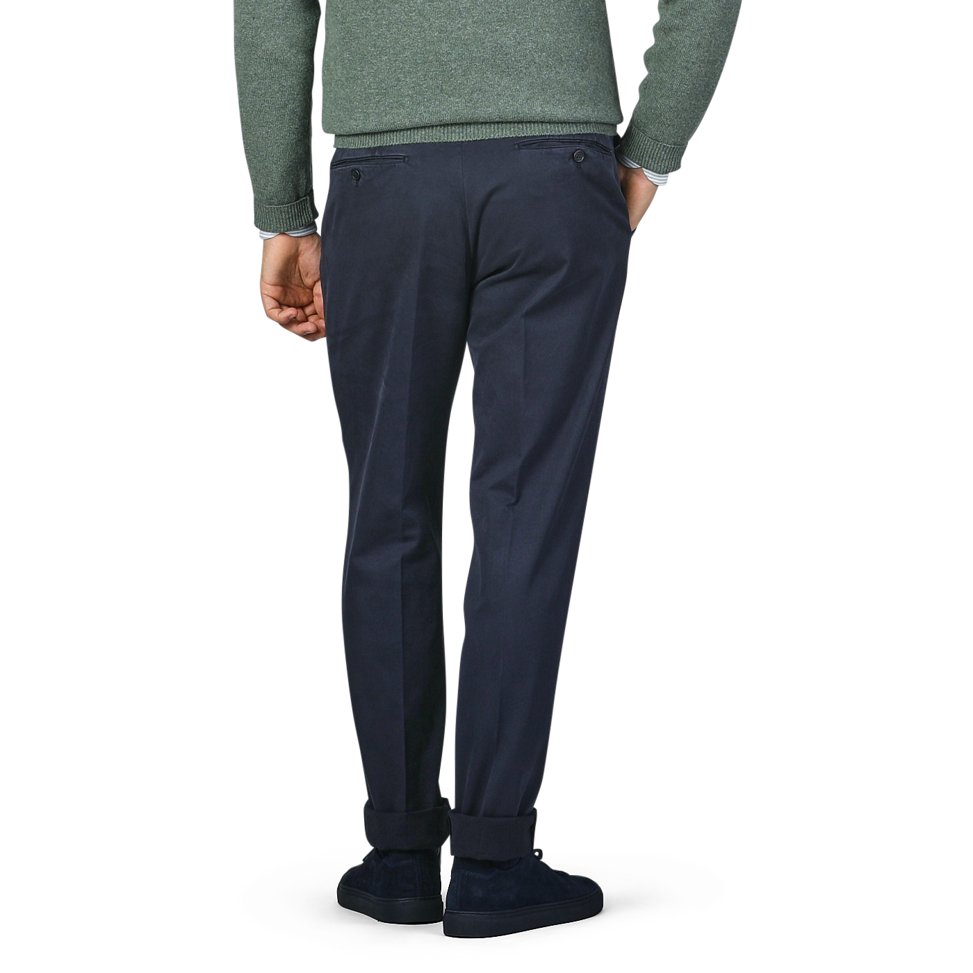 A person in a green sweater and Incotex Navy Blue Cotton Twill Regular Chinos is standing with their back to the camera.