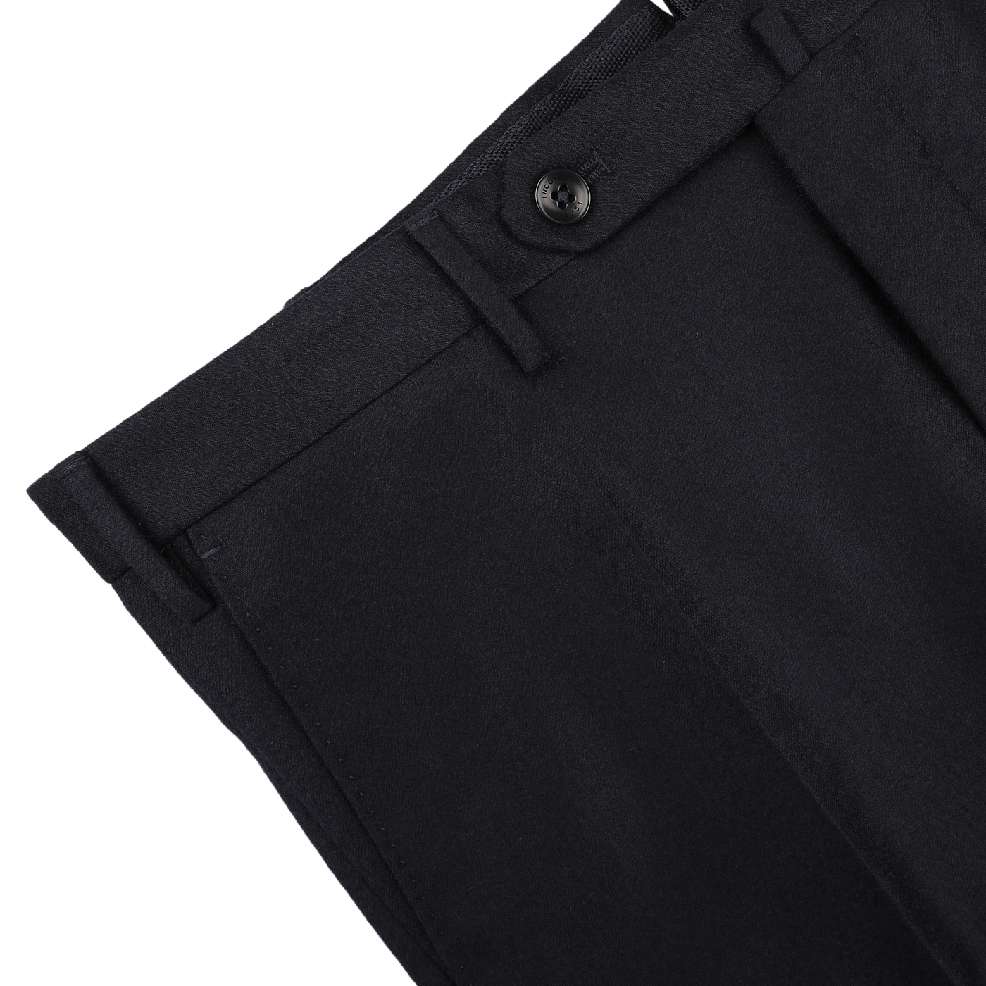 Close-up of the Incotex Navy Blue Wool Flannel Slim Trousers, emphasizing the sleek slim fit design, with a focus on the waistband, button, and part of a pocket against a plain background.