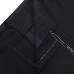 A close-up of the Navy Blue Wool Flannel Slim Trousers by Incotex, showcasing the visible zipper, button, and waistband detail.