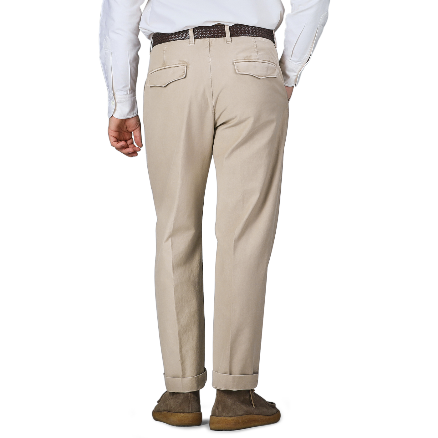 A person wearing a white shirt and Incotex Washed Beige Single Pleat Cotton Slacks with a brown belt, viewed from behind.