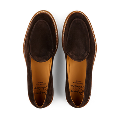 Pair of Dark Brown Suede Leather Alexis Loafers by Jacques Soloviére Paris with a modern silhouette viewed from above on a plain background.