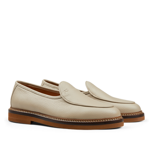 A men's wholecut loafer in Beige Grained Leather Lex loafers with a brown sole by Jacques Soloviére Paris.