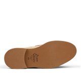 A single brown orthotic shoe insole with a visible "Jacques Soloviére Paris" brand name on its underside.