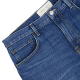 Close-up of Jeanerica's Medium Blue Washed Cotton TM005 Jeans with a focus on the front pocket and waistband.