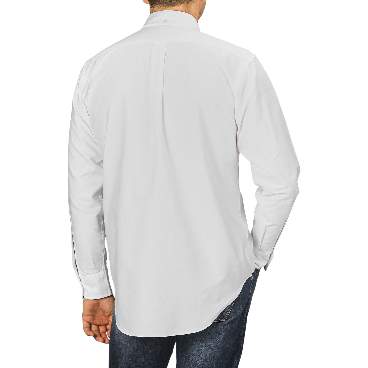 A person is shown from the back wearing a White Washed Cotton Oxford BD Shirt by Kamakura Shirts and dark jeans, with the left hand tucked in the pocket of the jeans.