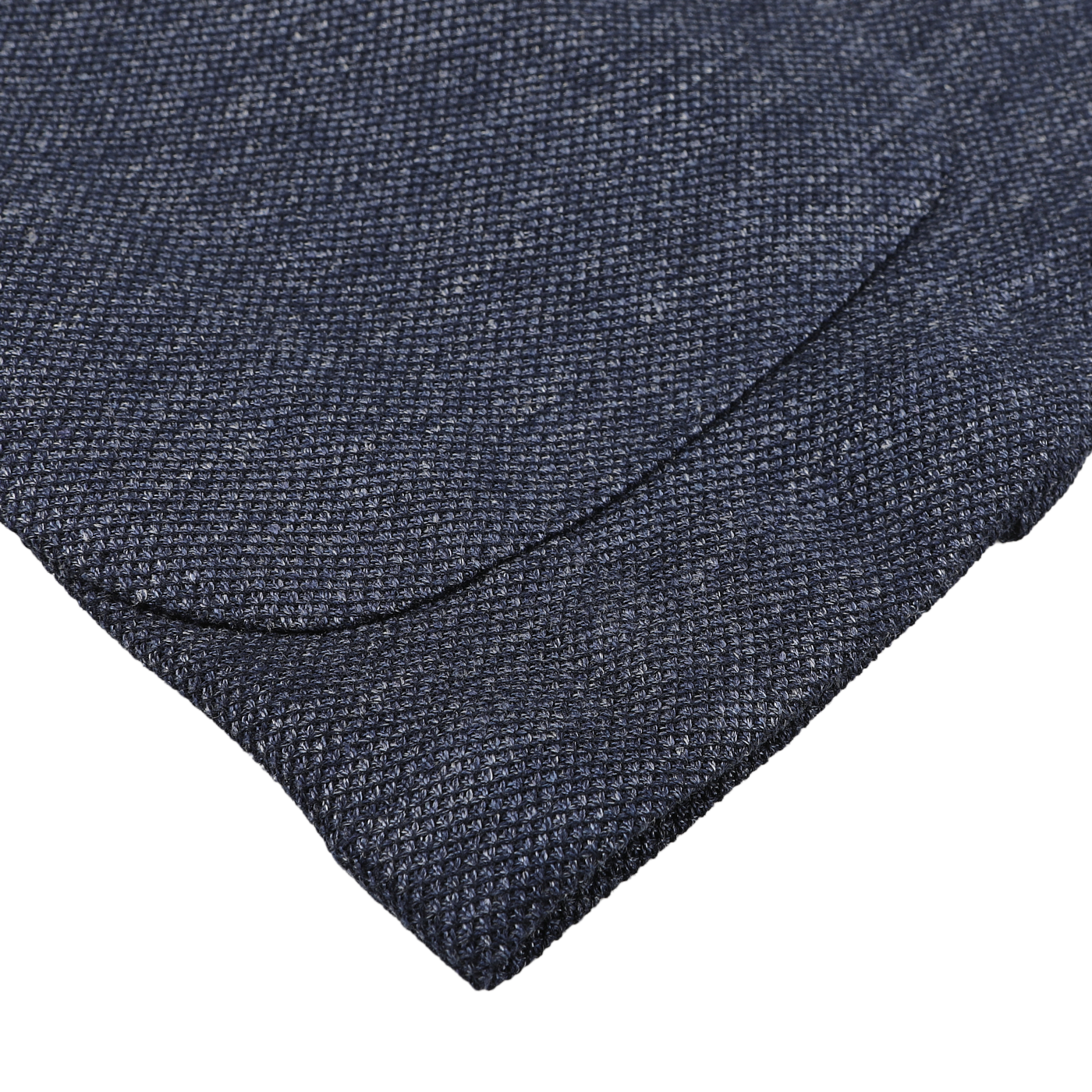 Close-up of a Dark Blue Linen Cotton Jersey Blazer by L.B.M. 1911, showcasing its textured fabric with a curved seam, reflective of the refined elegance synonymous with Italian tailoring.