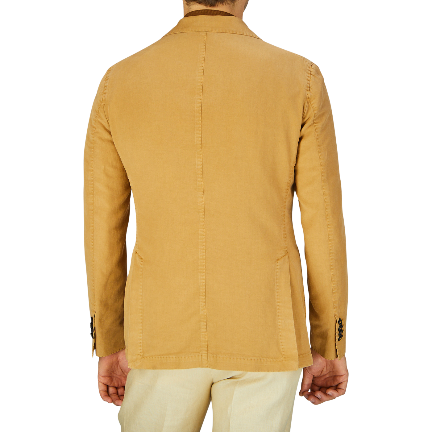 Rear view of a person wearing a Dark Beige Washed Cotton Linen Blazer by L.B.M. 1911 with a straight seam down the back.