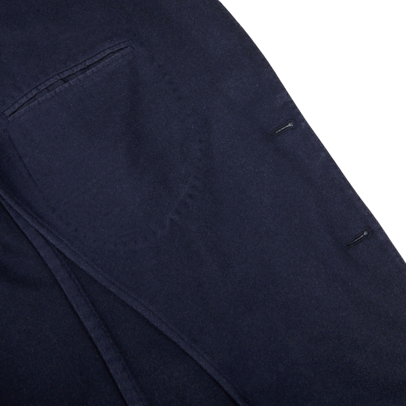 A close up of a dark blue pocket on a pair of pants with L.B.M. 1911 branding.