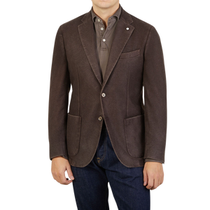A man wearing a L.B.M. 1911 Dark Brown Washed Wool Flannel Blazer and jeans.
