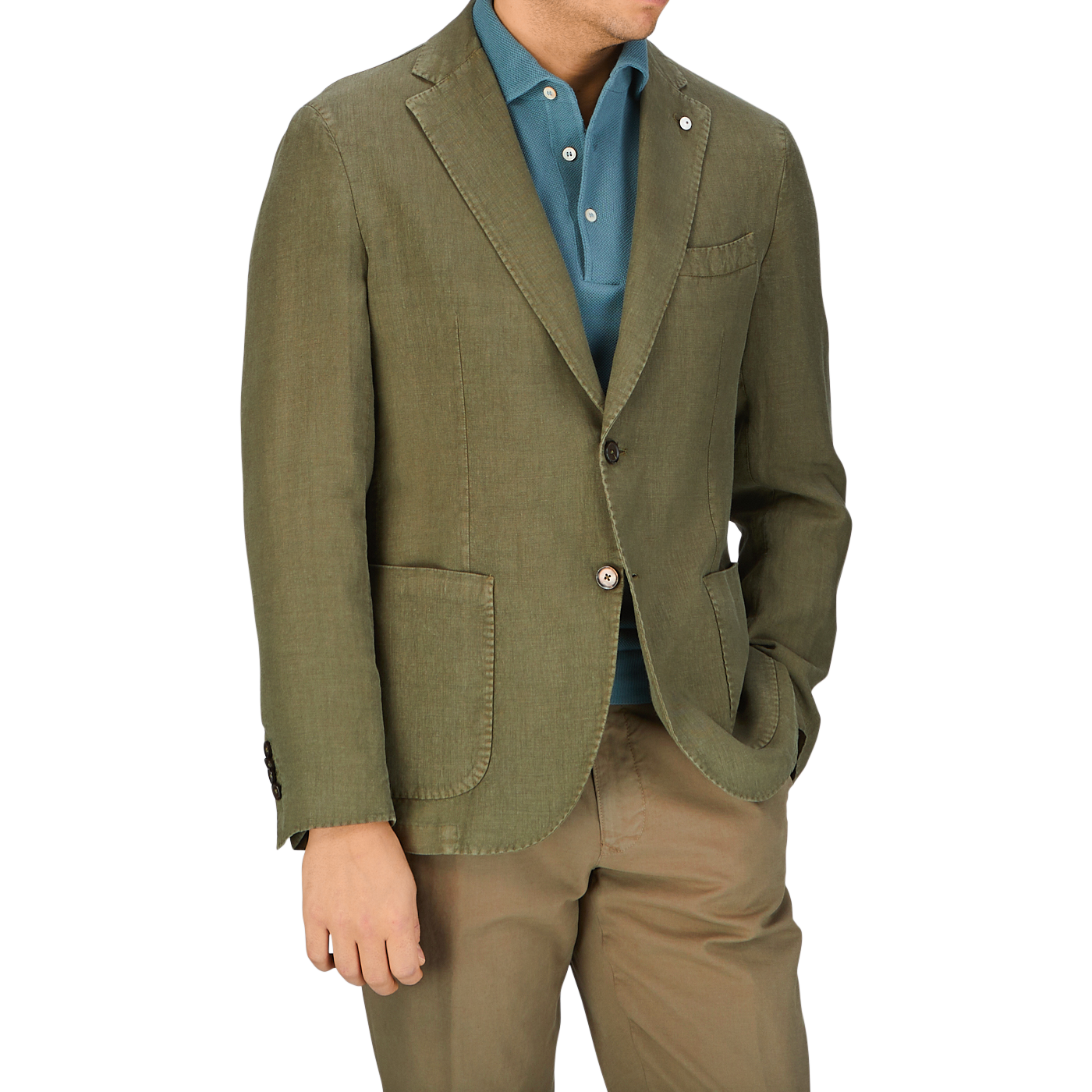 Man wearing a Grass Green Washed Linen Blazer from L.B.M. 1911, blue shirt, and beige pants from Italy.