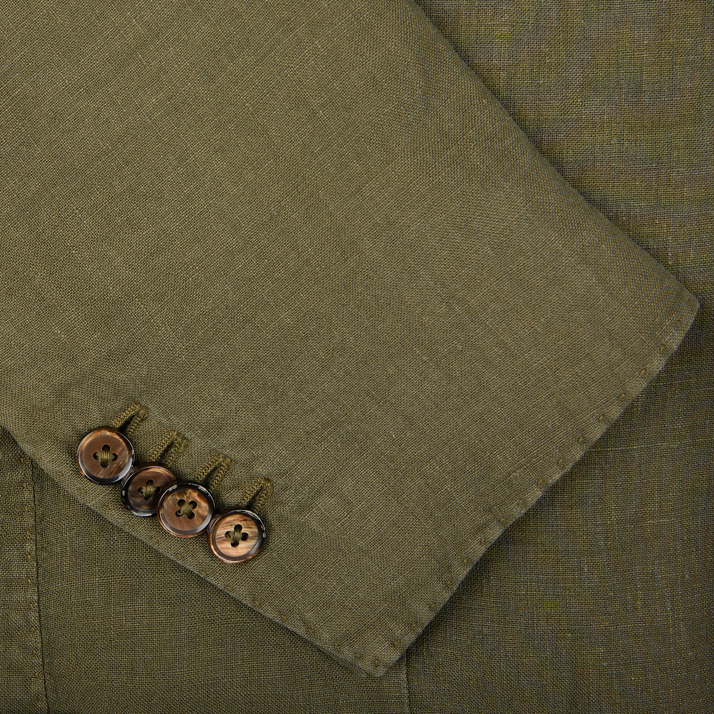 Grass Green Washed Linen Blazer with a flap and four brown buttons, designed in Italy by L.B.M. 1911.