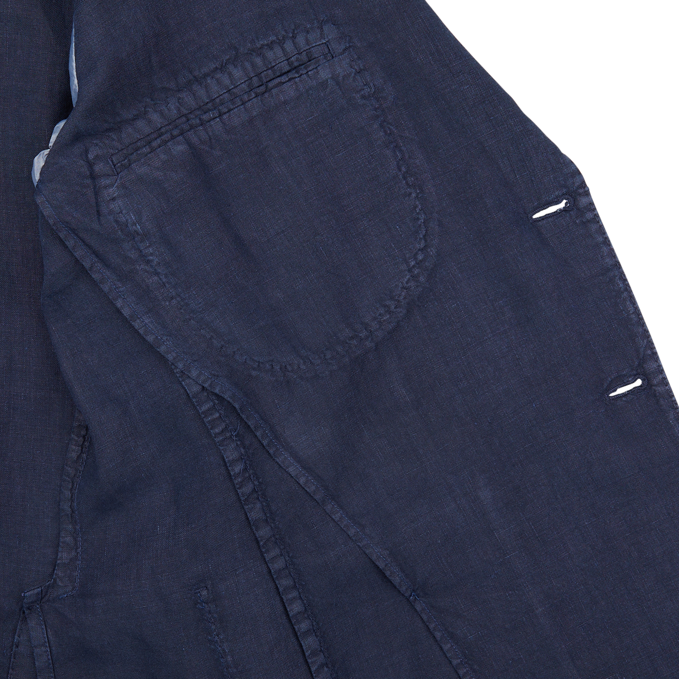 Close-up of a Navy Blue Washed Linen Blazer by L.B.M. 1911 with a pocket detail and button closures.
