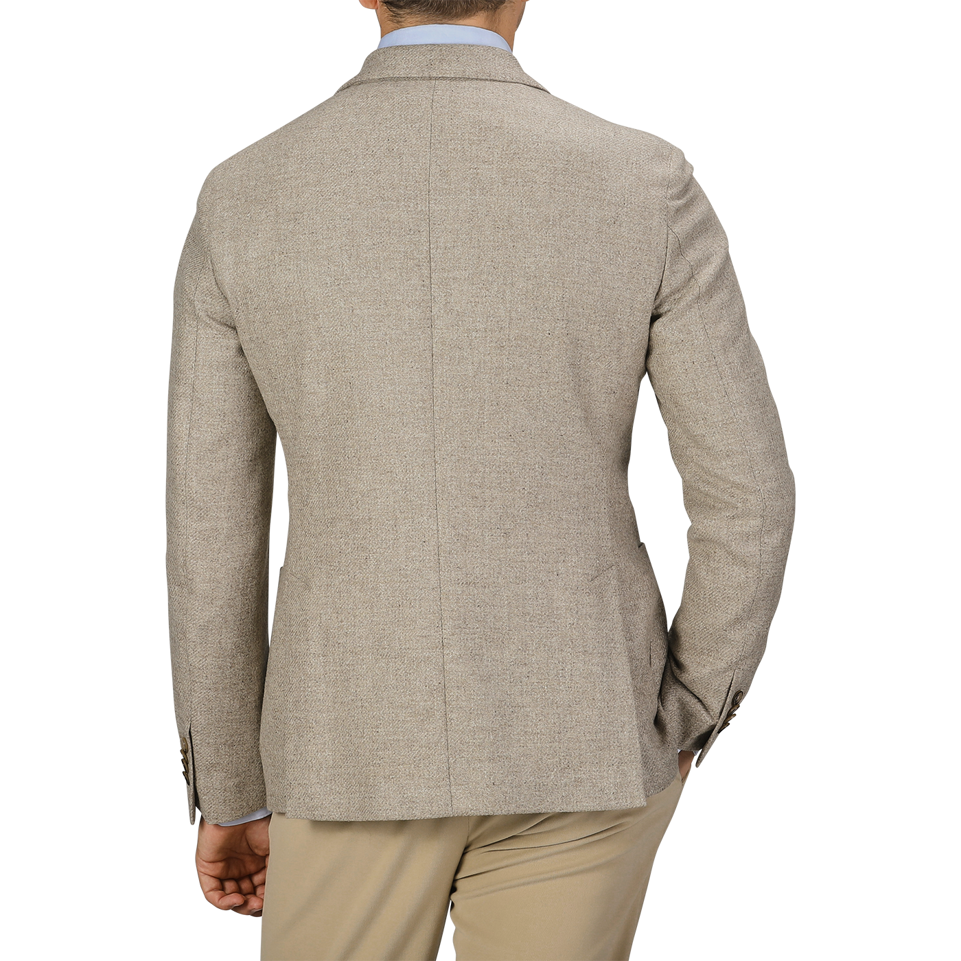 A man dressed in an Oatmel Beige Shetland Wool Cashmere Blazer by L.B.M. 1911, a light blue shirt, and khaki pants is seen from the back, with his right hand in his pocket.