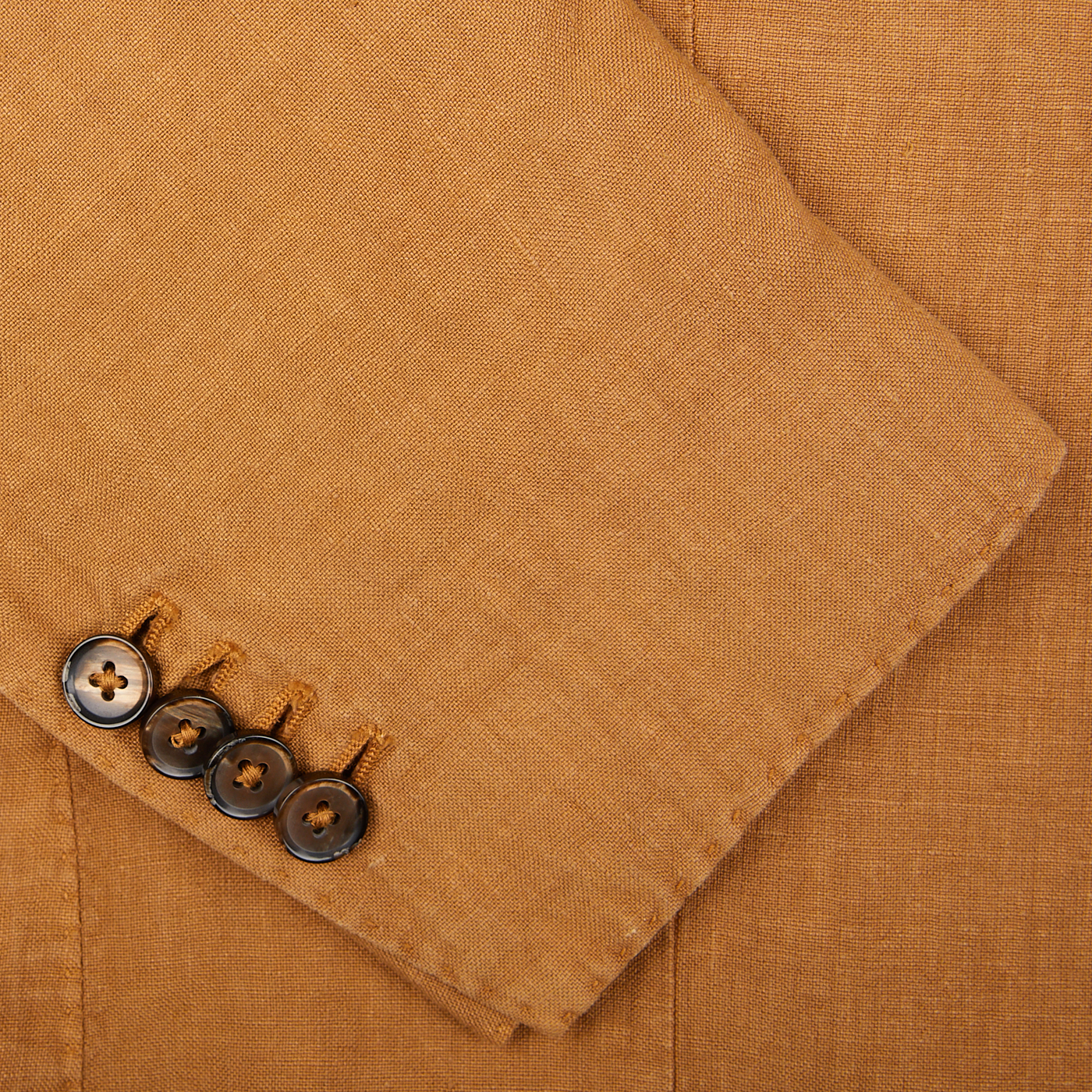 Close-up view of a Tobacco Brown Washed Linen Blazer with buttons by L.B.M. 1911.