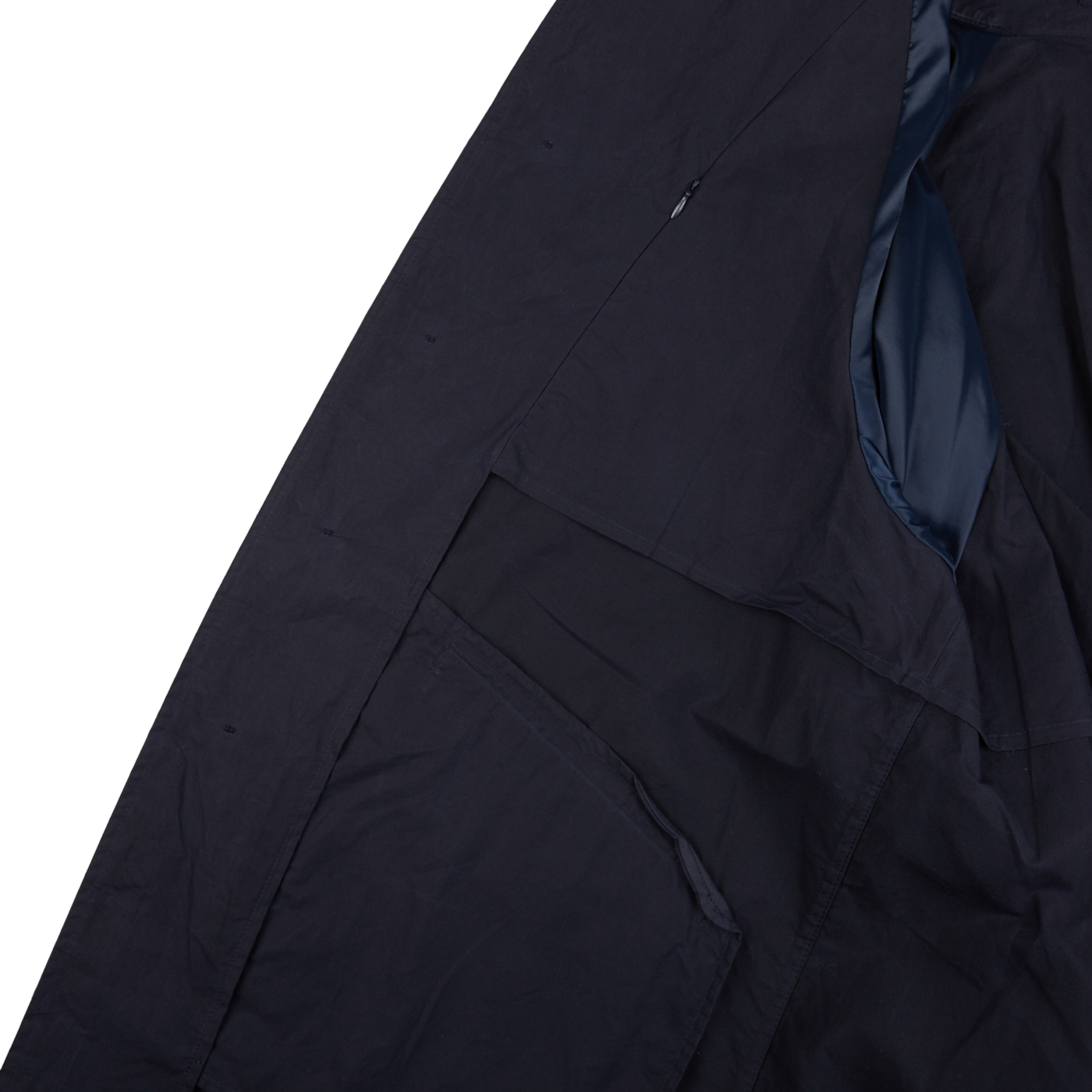 The back of a Navy Blue Waxed Cotton Kamikaze Trenchcoat by L'Impermeabile with a zippered pocket.