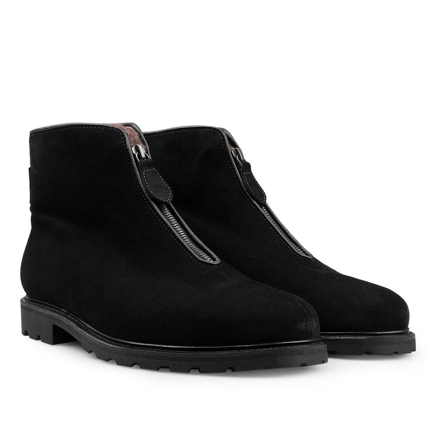 The Ludwig Reiter Black Suede Leather Après Ski Boots feature front zippers and durable Vibram rubber soles, perfect for an après-ski look.