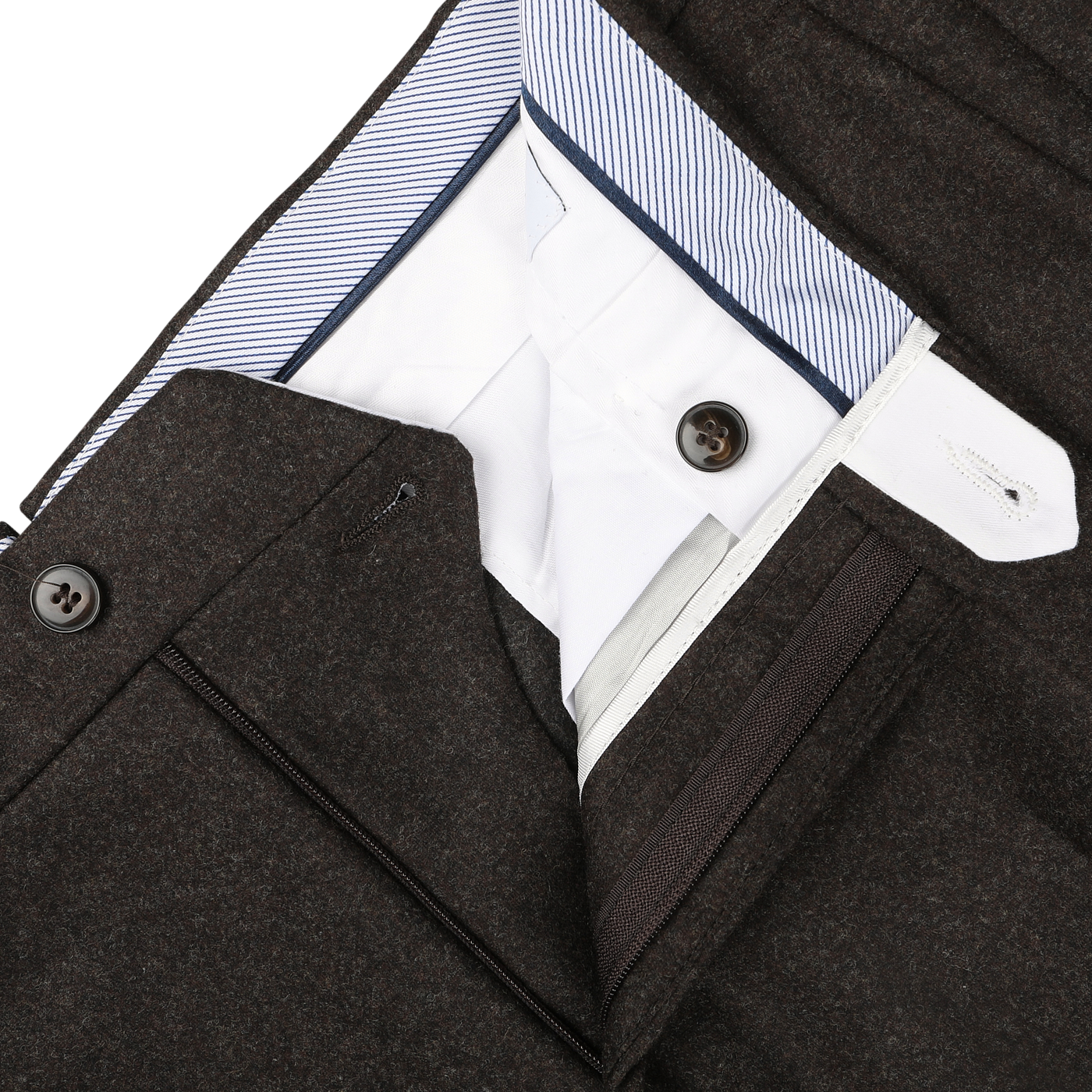 Close-up of the waistband and fly of dark brown trousers crafted from luxurious wool flannel by Luigi Bianchi, featuring buttons and a striped inner lining.