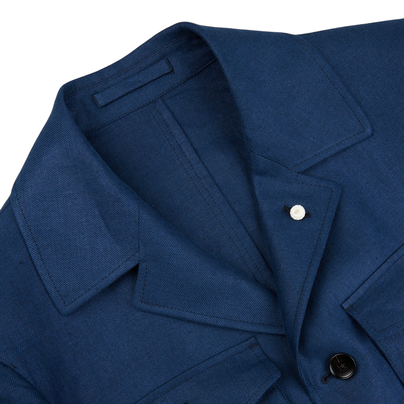 A close up of a Luigi Bianchi Indigo Blue Linen Twill Field Jacket.