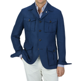 A man wearing a Luigi Bianchi Indigo Blue Linen Twill Field Jacket.