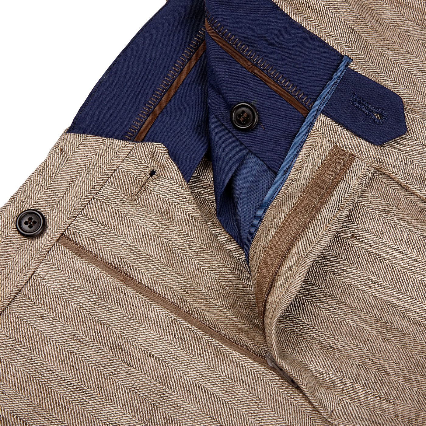 A close up of a Light Brown Herringbone Linen Suit with blue buttons, expertly tailored from pure linen by Luigi Bianchi.