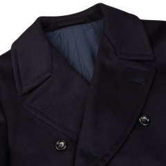 A close up of a Luigi Bianchi Navy Blue Wool Cashmere Dream Polo Coat.