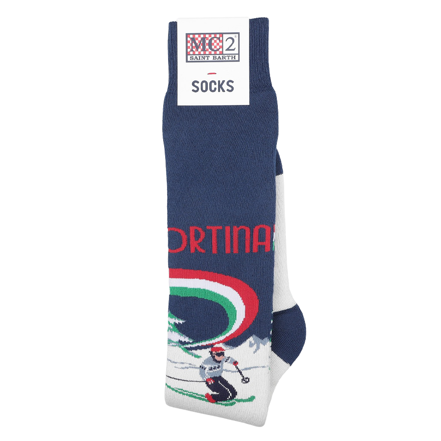 The Blue Cotton Cortina Print Socks by MC2 Saint Barth are made from a warm cotton blend, featuring a skiing design and are thoughtfully packaged with a brand label.