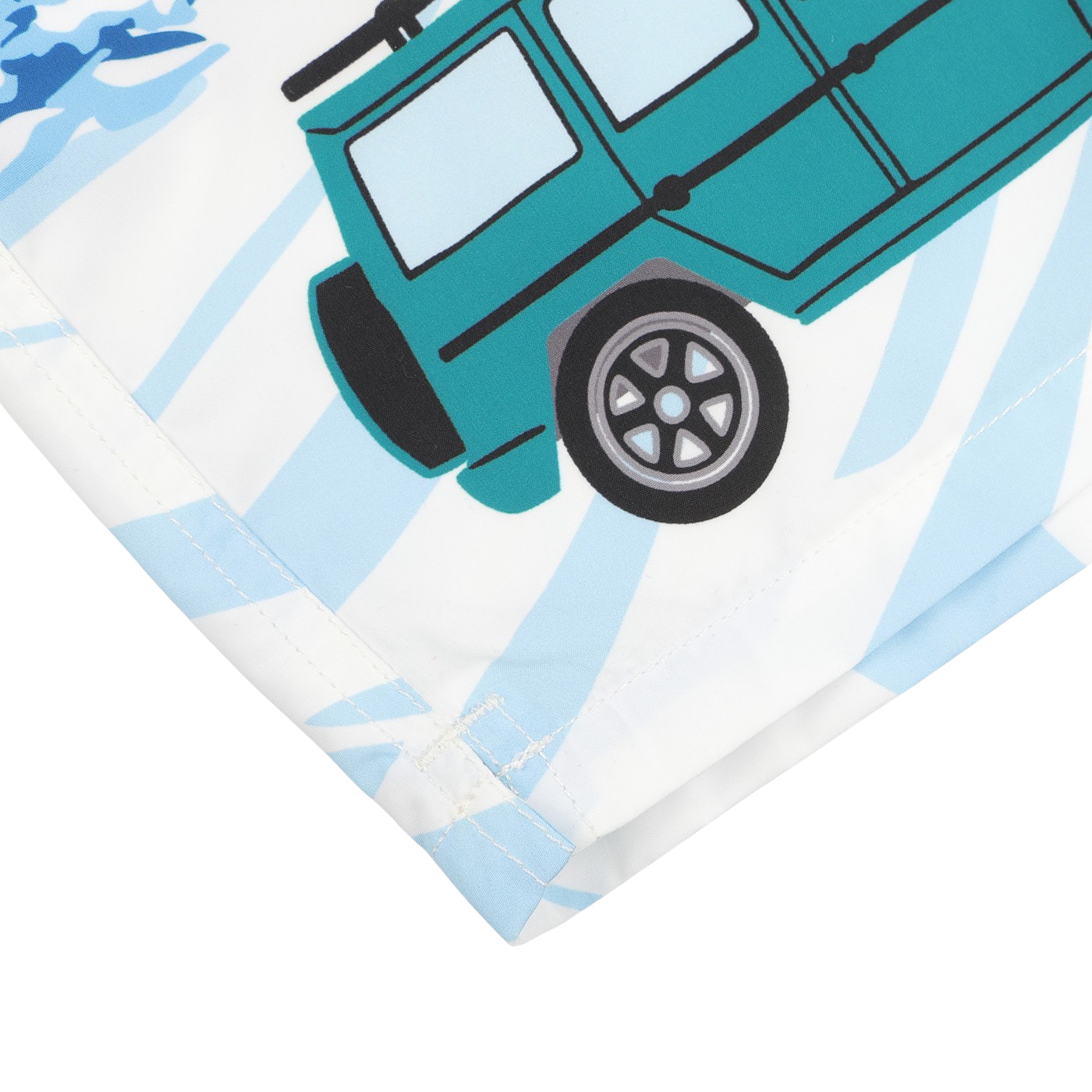 Close-up of the Blue St. Moritz Printed Swim Shorts by MC2 Saint Barth, showcasing a blue-green jeep illustration with bold outlines and a stylized design on quick-drying fabric. The background features light blue and white patterns evoking the serene ambiance of St. Moritz.