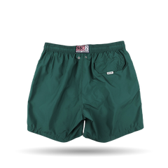 The MC2 Saint Barth British Green Pantone 18-5315 Swim Shorts offer a comfortable elastic waistband and a convenient back pocket, made from quick-drying fabric.